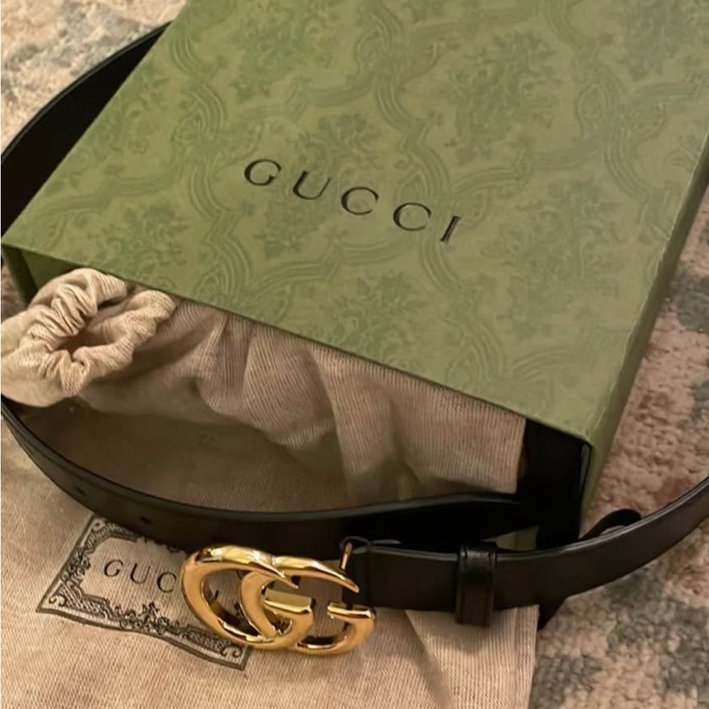 Gucci Black and Gold Leather Belt with Iconic GG Buckle